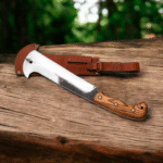 Handmade high carbon steel bushcraft machete, full tang outdoor knife, handcrafted survival machete, durable wood handle knife, heavy-duty camping tool, wilderness bushcraft blade, hand-forged carbon steel machete, sharp outdoor survival knife, adventure-ready bushcraft tool, leather sheath machete, handmade camping knife, premium carbon steel blade, handcrafted outdoor gear, rugged field knife, wood grip machete, hunting and camping essential, handmade collector’s machete, durable handmade blade, outdoor gift for men, high-quality bushcraft knife.