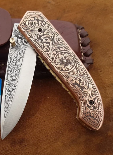 Handmade D2 Steel Folding Knife: Engraved Copper Handle, Leather Sheath & Wood Box - Image 2